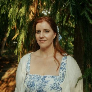 Photo of Tristen Stawicki in a blue and white dress